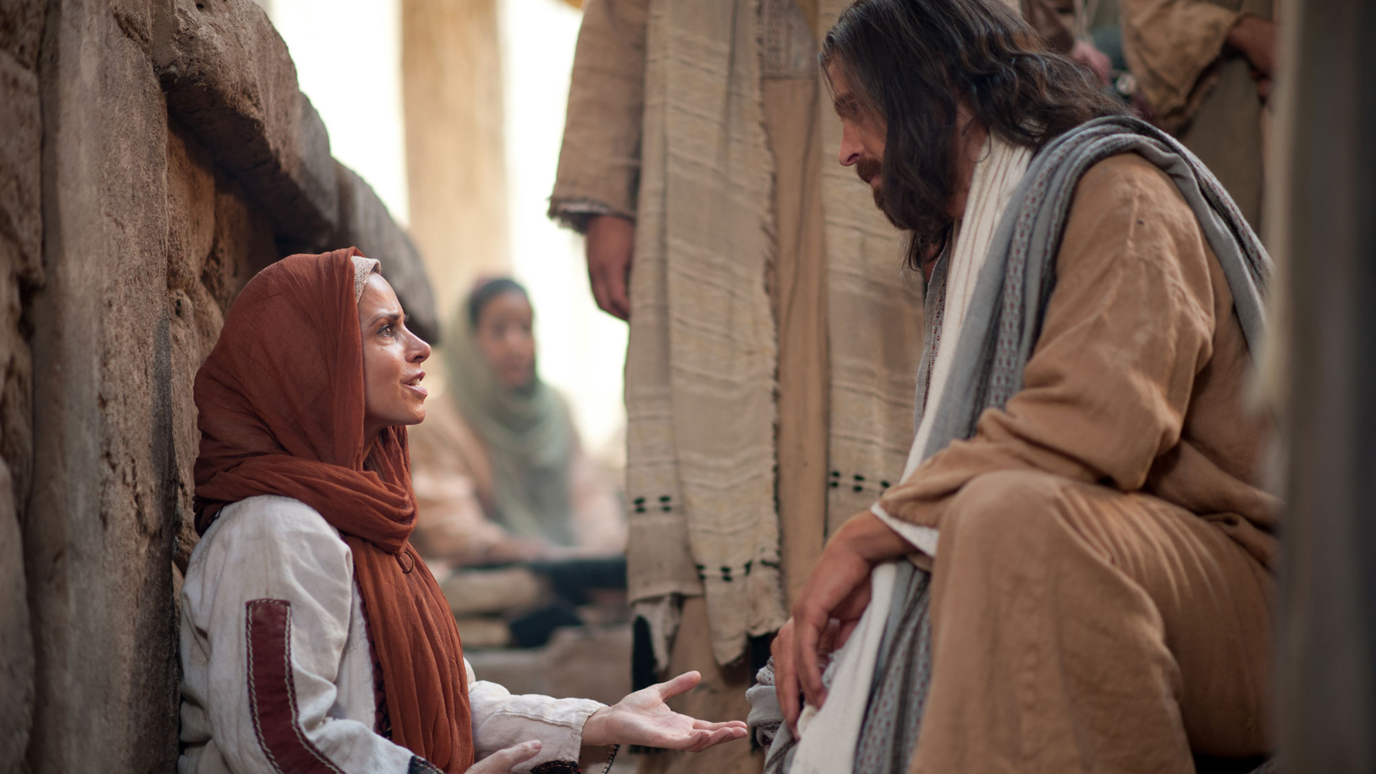Jesus heals a woman with an issue of blood. Image via lds.org