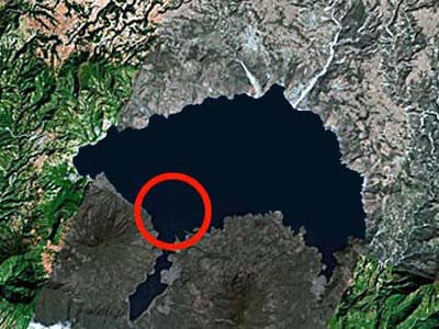 Circle indicates location of sunken ruins of Samabaj at Lake Atitlan, Guatemala