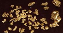 Photo of gold nuggets by James St. John. Image via Wikimedia Commons.