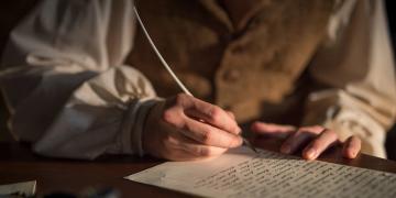 Oliver Cowdery writes the translation of The Book of Mormon on parchment