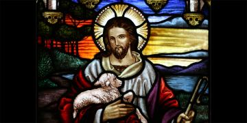 Stained glass of Jesus Christ as the Good Shepherd at St John the Baptist's Anglican Church. Image via Wikimedia Commons.