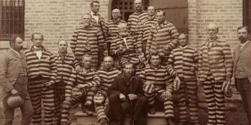 George Q. Cannon and other polygamist men, prisoners for their practice of polygamy, pose for a photo.